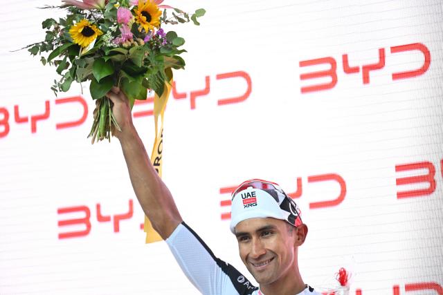UAE Team Emirates-XRG's Ecuadorian rider Jhonatan Narvaez celebrates on the podium after winning the third stage, 157,4 km from Bad Ragaz to Bad Ragaz, of the Men’s Tour of Switzerland (Tour de Suisse) cycling race in Bad Ragaz on June 19, 2026. (Photo by HAROLD CUNNINGHAM / AFP)