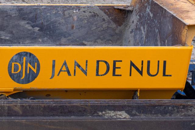 (FILES) This photograph shows the logo of Jan De Nul company with activities in offshore energy, dredging solutions, construction projects and planet redevelopment in Antwerp on August 4, 2025. The Argentine government confirmed on June 19, 2026 that the consortium comprising the Belgian company Jan De Nul and the local firm Servimagnus will hold a 25-year concession for the dredging and marking of the Parana-Paraguay waterway, through which 80 per cent of the country’s exports are transported. (Photo by JONAS ROOSENS / Belga / AFP) / Belgium OUT
