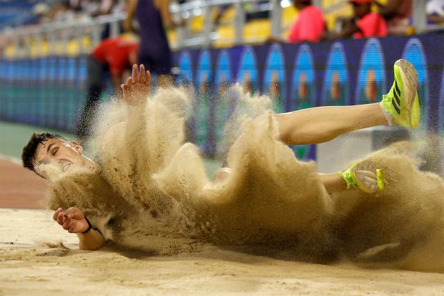 Greece's Nikolaos Andrikopoulos competes in the men's triple jump final during the IAAF Diamond League competition at Suheim Bin Hamad Stadium in Doha on June 19, 2026. (Photo by KARIM JAAFAR / AFP)