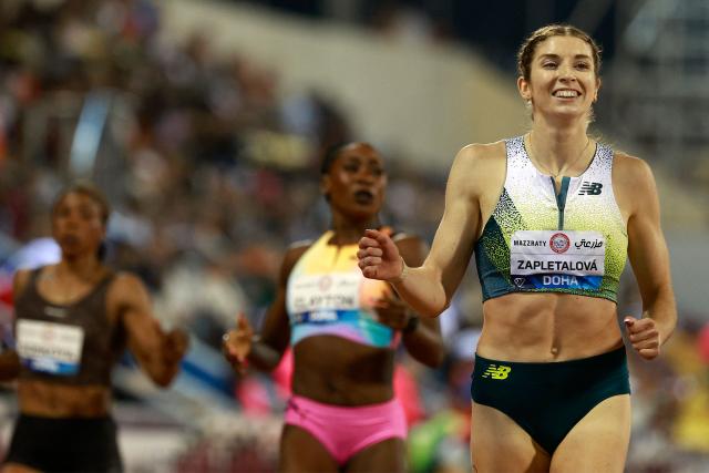 Slovakia's Emma Zapletalova's reacts after winning the women's 400m hurdles final during the IAAF Diamond League competition at Suheim Bin Hamad Stadium in Doha on June 19, 2026. (Photo by KARIM JAAFAR / AFP)