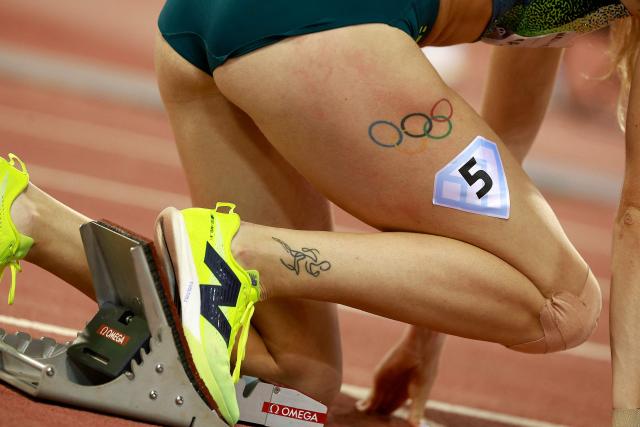 Slovakia's Emma Zapletalova's Olympic rings tattoo is pictured as she prepares to compete in the women's 400m hurdles final during the IAAF Diamond League competition at Suheim Bin Hamad Stadium in Doha on June 19, 2026. (Photo by KARIM JAAFAR / AFP)
