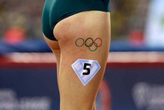 Slovakia's Emma Zapletalova's Olympic rings tattoo is pictured before she competes in the women's 400m hurdles final during the IAAF Diamond League competition at Suheim Bin Hamad Stadium in Doha on June 19, 2026. (Photo by KARIM JAAFAR / AFP)