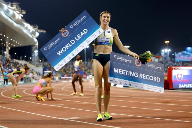 Slovakia's Emma Zapletalova's celebrates after setting a meeting record in the women's 400m hurdles final during the IAAF Diamond League competition at Suheim Bin Hamad Stadium in Doha on June 19, 2026. (Photo by KARIM JAAFAR / AFP)
