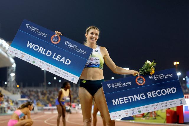 Slovakia's Emma Zapletalova's celebrates after setting a meeting record in the women's 400m hurdles final during the IAAF Diamond League competition at Suheim Bin Hamad Stadium in Doha on June 19, 2026. (Photo by KARIM JAAFAR / AFP)