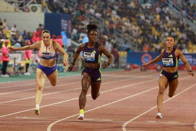 Jamaica's Kemba Nelson competes in the women's 100m final  during the IAAF Diamond League competition at Suheim Bin Hamad Stadium in Doha on June 19, 2026. (Photo by KARIM JAAFAR / AFP)