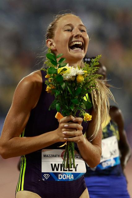 USA's Addison Wiley celebrates winning the women's 800m final during the IAAF Diamond League competition at Suheim Bin Hamad Stadium in Doha on June 19, 2026. (Photo by KARIM JAAFAR / AFP)