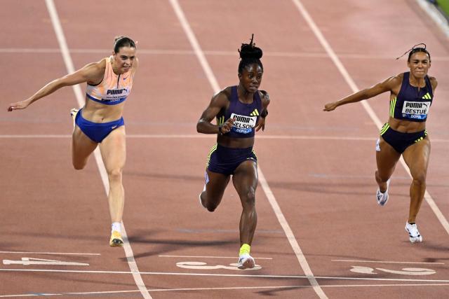 Jamaica's Kemba Nelson crosses the finish line to win the women's 100m final  during the IAAF Diamond League competition at Suheim Bin Hamad Stadium in Doha on June 19, 2026. (Photo by MAHMUD HAMS / AFP)