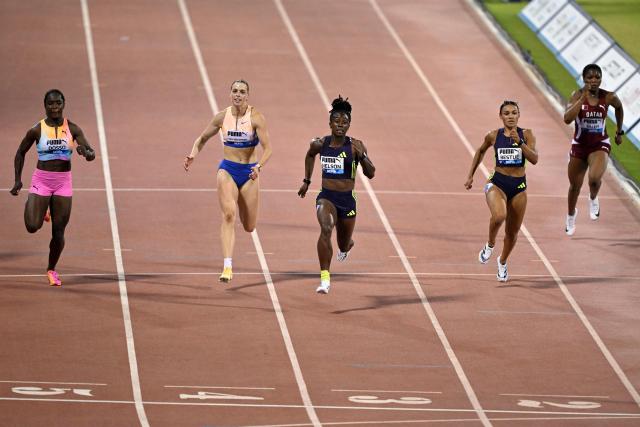 Jamaica's Kemba Nelson competes in the women's 100m final  during the IAAF Diamond League competition at Suheim Bin Hamad Stadium in Doha on June 19, 2026. (Photo by Mahmud HAMS / AFP)