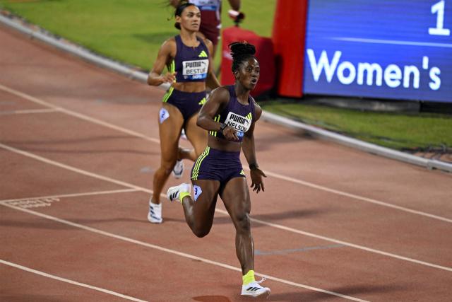 Jamaica's Kemba Nelson reacts after winning the women's 100m final during the IAAF Diamond League competition at Suheim Bin Hamad Stadium in Doha on June 19, 2026. (Photo by Mahmud HAMS / AFP)