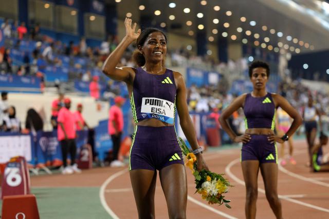 Ethiopia's Medina Eisa celebrates winning the women's 5000m final during the IAAF Diamond League competition at Suheim Bin Hamad Stadium in Doha on June 19, 2026. (Photo by KARIM JAAFAR / AFP)
