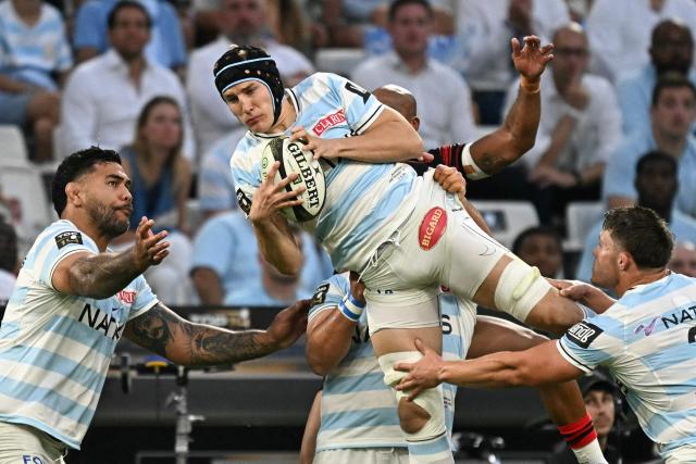 Racing 92' French flanker Maxime Baudonne jumps for the ball during the French Top14 rugby union semi-final match between Stade Toulousain Rugby (Toulouse) and Racing 92 at the Velodrome stadium in Marseille, southern France on June 19, 2026. (Photo by Gabriel BOUYS / AFP)