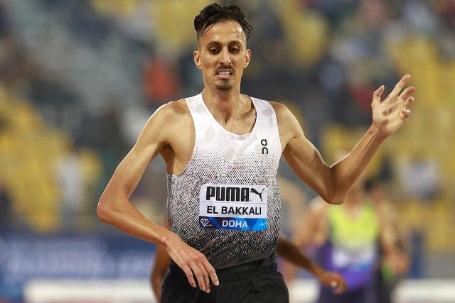 Morocco's Soufiane el-Bakkali celebrates winning the men's 3000m steeplechase final during the IAAF Diamond League competition at Suheim Bin Hamad Stadium in Doha on June 19, 2026. (Photo by KARIM JAAFAR / AFP)