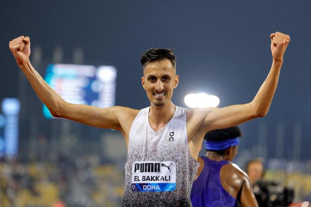 Morocco's Soufiane el-Bakkali celebrates winning the men's 3000m steeplechase final during the IAAF Diamond League competition at Suheim Bin Hamad Stadium in Doha on June 19, 2026. (Photo by KARIM JAAFAR / AFP)