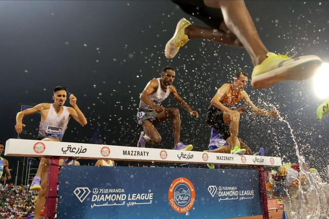 Morocco's Soufiane el-Bakkali competes in the men's 3000m steeplechase final during the IAAF Diamond League competition at Suheim Bin Hamad Stadium in Doha on June 19, 2026. (Photo by KARIM JAAFAR / AFP)