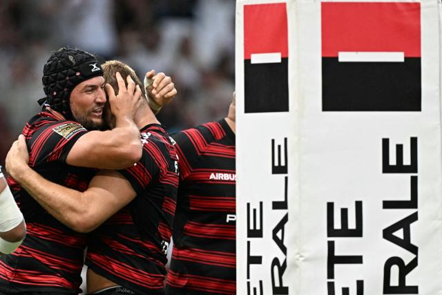 Toulouse's French flanker Francois Cros celebrates scoring a try during the French Top14 rugby union semi-final match between Stade Toulousain Rugby (Toulouse) and Racing 92 at the Velodrome stadium in Marseille, southern France on June 19, 2026. (Photo by Gabriel BOUYS / AFP)