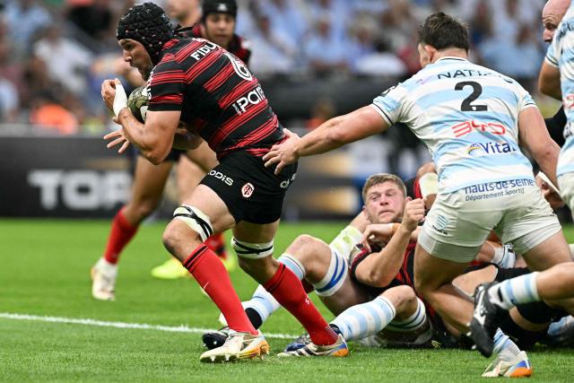 Toulouse's French flanker Francois Cros scores a try during the French Top14 rugby union semi-final match between Stade Toulousain Rugby (Toulouse) and Racing 92 at the Velodrome stadium in Marseille, southern France on June 19, 2026. (Photo by Gabriel BOUYS / AFP)