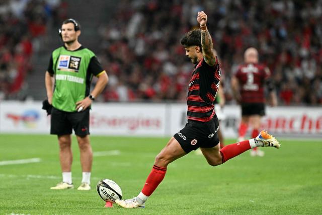 Toulouse's French fly-half Romain Ntamack kicks a conversion during the French Top14 rugby union semi-final match between Stade Toulousain Rugby (Toulouse) and Racing 92 at the Velodrome stadium in Marseille, southern France on June 19, 2026. (Photo by Gabriel BOUYS / AFP)