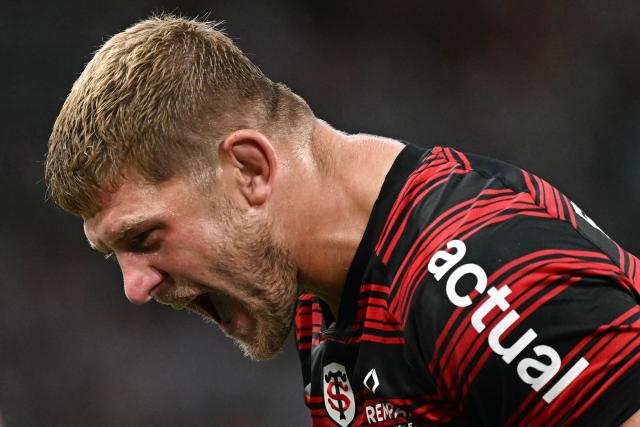 Toulouse's English flanker Jack Willis celebrates scoring a try during the French Top14 rugby union semi-final match between Stade Toulousain Rugby (Toulouse) and Racing 92 at the Velodrome stadium in Marseille, southern France on June 19, 2026. (Photo by Gabriel BOUYS / AFP)
