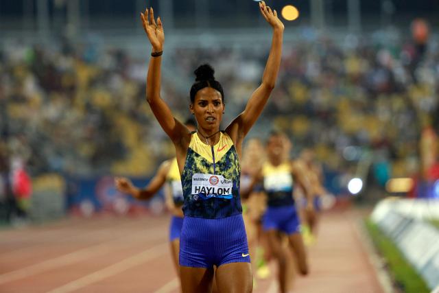 Ethiopia's Birke Haylom reacts after winning the women's 1500m final during the IAAF Diamond League competition at Suheim Bin Hamad Stadium in Doha on June 19, 2026. (Photo by KARIM JAAFAR / AFP)