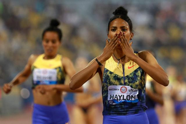 Ethiopia's Birke Haylom reacts after winning the women's 1500m final during the IAAF Diamond League competition at Suheim Bin Hamad Stadium in Doha on June 19, 2026. (Photo by KARIM JAAFAR / AFP)