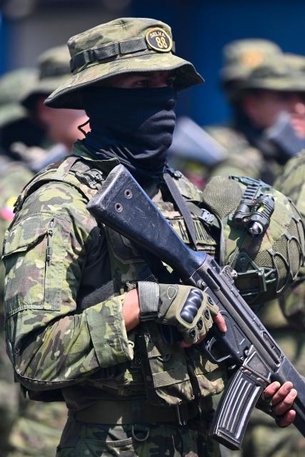 Indigenous soldiers from Ecuador's elite IWIAS unit arrive at Simon Bolivar Air Base in Guayaquil, Ecuador, on June 19, 2026, amid a state of emergency declared in 10 provinces. Ecuador's President Daniel Noboa declared a new state of emergency on June 17, 2026, in 10 of the country's 24 provinces amid a surge in violence by drug trafficking groups. (Photo by MARCOS PIN / AFP)