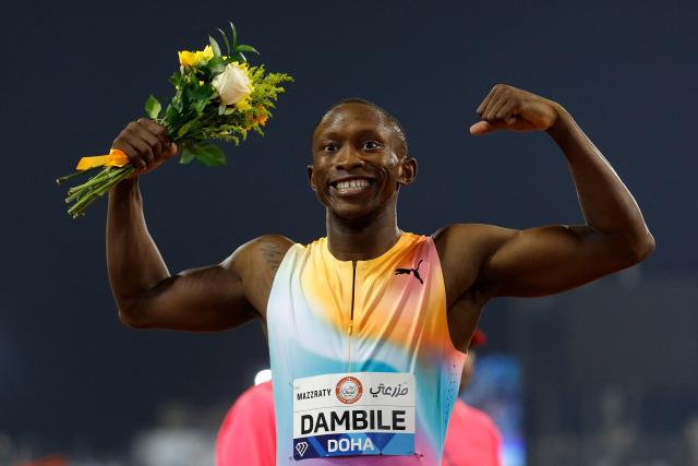 South Africa's Sinesipho Dambile celebrates winning the men's 200m final during the IAAF Diamond League competition at Suheim Bin Hamad Stadium in Doha on June 19, 2026. (Photo by KARIM JAAFAR / AFP)