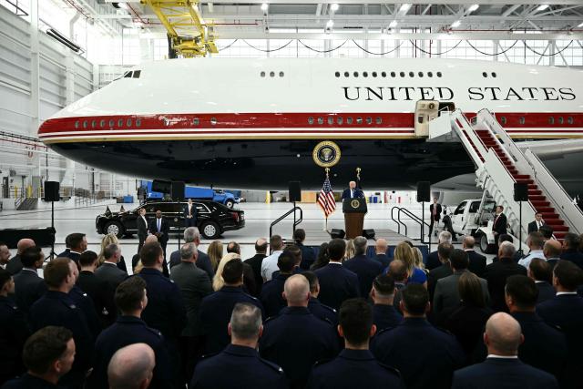 US President Donald Trump speaks in front of the new Air Force One, gifted to him by Qatar, in a hangar at Joint Base Andrews in Maryland on June 19, 2026. White House officials bade farewell on June 18, 2026 to one of the two jets that have been used to transport US presidents for more than 30 years. The goodbye messages fueled speculation that a Boeing 747 controversially gifted to President Donald Trump by the Gulf emirate of Qatar is now due to enter service. Trump will be heading to Joint Base Andrews before spending the weekend at Camp David. (Photo by Brendan SMIALOWSKI / AFP)