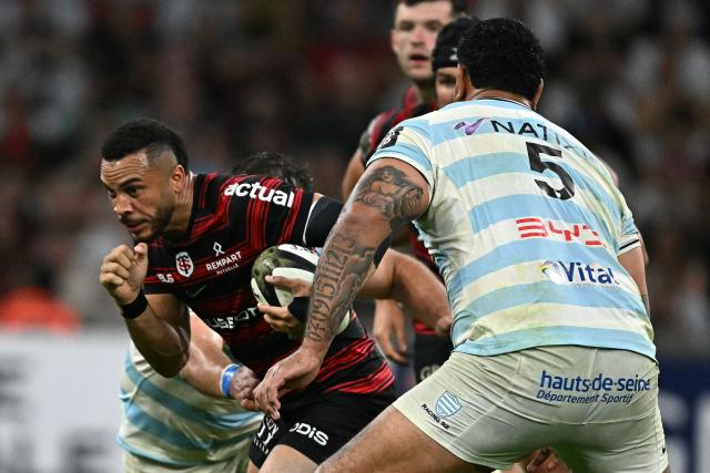 Toulouse's French wing Matthis Lebel runs with the ball during the French Top14 rugby union semi-final match between Stade Toulousain Rugby (Toulouse) and Racing 92 at the Velodrome stadium in Marseille, southern France on June 19, 2026. (Photo by Gabriel BOUYS / AFP)