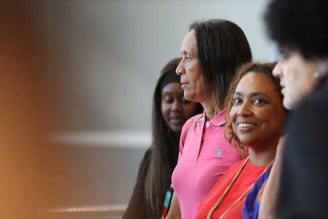 Ana Candida Evora (C), the mother Cape Verde's goalkeeper Vozinha, exits a terminal upon arrival at Miami International Airport on June 19, 2026, during the 2026 World Cup football tournament. Vozinha's mother, who was unable to enter the United States over visa price issues, arrived to the country to attend the upcoming matches of Cape Verde. (Photo by PATRICIA DE MELO MOREIRA / AFP)