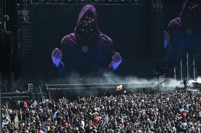 Heavy metal fans enjoy a show during the 19th edition of Hellfest rock and heavy metal festival, in Clisson, western France, on June 19, 2026. (Photo by Sebastien Salom-Gomis / AFP)
