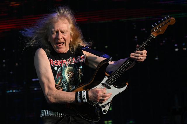 British guitarist Janick Gers from Iron Maiden performs during the 19th edition of Hellfest rock and heavy metal festival, in Clisson, western France, on June 19, 2026. (Photo by Sebastien Salom-Gomis / AFP)