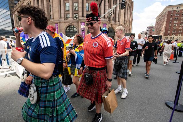 Members of the Tartan Army make their way to South Station to board trains to Boston Stadium to watch the upcoming World Cup match between Scotland and Morocco in Boston, Massachusetts, on June 19, 2026. From drinking the bars dry to lustily serenading an iconic baseball stadium with a rendition of "Flower of Scotland", the bagpipe-playing, kilt-wearing hordes of the Tartan Army have captivated Boston since arriving at the World Cup. Scotland's famously good-natured travelling supporters had waited nearly 30 years for the chance to follow their team to a World Cup and the thousands who have made the journey to the tournament are merrily making up for lost time, to the delight of Bostonians. (Photo by JOSEPH PREZIOSO / AFP)