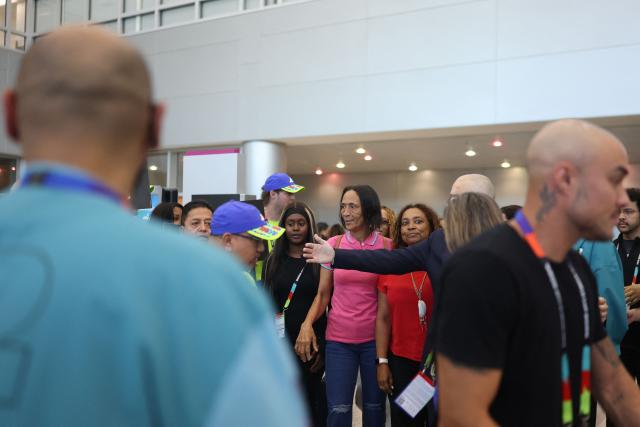 Ana Candida Evora (C), the mother Cape Verde's goalkeeper Vozinha, reacts upon arrival at Miami International Airport on June 19, 2026, during the 2026 World Cup football tournament. Vozinha's mother, who was unable to enter the United States over visa price issues, arrived to the country to attend the upcoming matches of Cape Verde. (Photo by PATRICIA DE MELO MOREIRA / AFP)