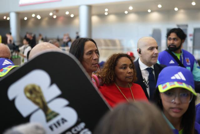 Ana Candida Evora (C), the mother Cape Verde's goalkeeper Vozinha, walks upon arrival at Miami International Airport on June 19, 2026, during the 2026 World Cup football tournament. Vozinha's mother, who was unable to enter the United States over visa price issues, arrived to the country to attend the upcoming matches of Cape Verde. (Photo by PATRICIA DE MELO MOREIRA / AFP)