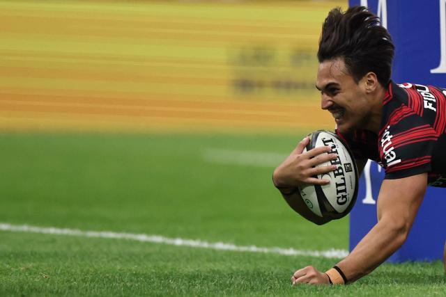 Toulouse's French centre Kalvin Gourgues scores a try during the French Top14 rugby union semi-final match between Stade Toulousain Rugby (Toulouse) and Racing 92 at the Velodrome stadium in Marseille, southern France on June 19, 2026. (Photo by Thibaud MORITZ / AFP)