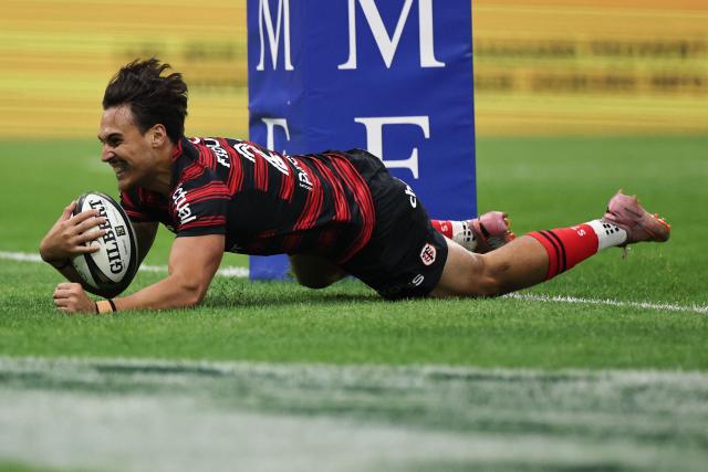 Toulouse's French centre Kalvin Gourgues scores a try during the French Top14 rugby union semi-final match between Stade Toulousain Rugby (Toulouse) and Racing 92 at the Velodrome stadium in Marseille, southern France on June 19, 2026. (Photo by Thibaud MORITZ / AFP)