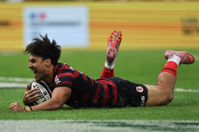 Toulouse's French centre Kalvin Gourgues scores a try during the French Top14 rugby union semi-final match between Stade Toulousain Rugby (Toulouse) and Racing 92 at the Velodrome stadium in Marseille, southern France on June 19, 2026. (Photo by Thibaud MORITZ / AFP)