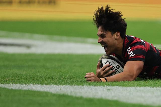 Toulouse's French centre Kalvin Gourgues scores a try during the French Top14 rugby union semi-final match between Stade Toulousain Rugby (Toulouse) and Racing 92 at the Velodrome stadium in Marseille, southern France on June 19, 2026. (Photo by Thibaud MORITZ / AFP)