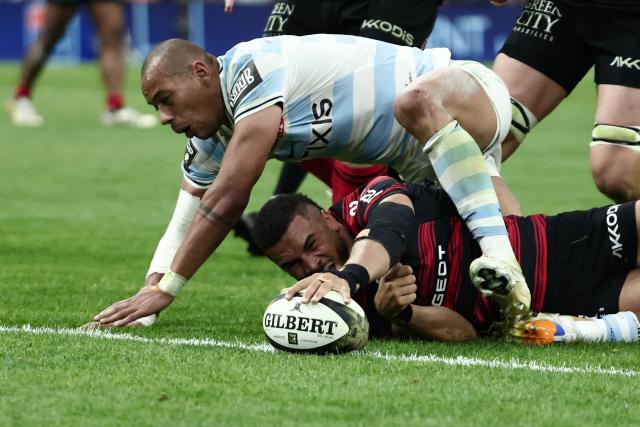 Toulouse's French wing Matthis Lebel scores a try during the French Top14 rugby union semi-final match between Stade Toulousain Rugby (Toulouse) and Racing 92 at the Velodrome stadium in Marseille, southern France on June 19, 2026. (Photo by Thibaud MORITZ / AFP)
