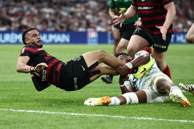 Toulouse's French wing Matthis Lebel scores a try during the French Top14 rugby union semi-final match between Stade Toulousain Rugby (Toulouse) and Racing 92 at the Velodrome stadium in Marseille, southern France on June 19, 2026. (Photo by Thibaud MORITZ / AFP)