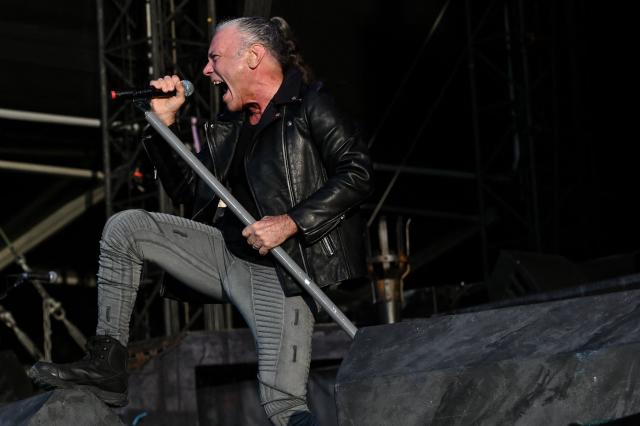 British singer Bruce Dickinson from Iron Maiden performs during the 19th edition of Hellfest rock and heavy metal festival, in Clisson, western France, on June 19, 2026. (Photo by Sebastien Salom-Gomis / AFP)