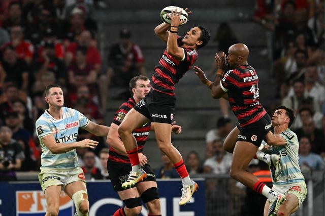 Toulouse's Italian full back Ange Capuozzo jumps for the ball during the French Top14 rugby union semi-final match between Stade Toulousain Rugby (Toulouse) and Racing 92 at the Velodrome stadium in Marseille, southern France on June 19, 2026. (Photo by Gabriel BOUYS / AFP)