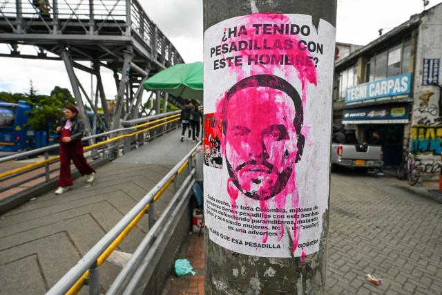 A campaign poster against Colombia's presidential candidate Abelardo de la Espriella of the political movement Defensores de la Patria is seen in Bogota on June 19, 2026. Colombians vote on June 21, 2026 in a presidential runoff pitting a hard-right opera-singer-turned-lawyer against a leftist senator, an election with stark consequences for the country's stumbling peace process with armed groups and strained ties with Washington. (Photo by Juan BARRETO / AFP)