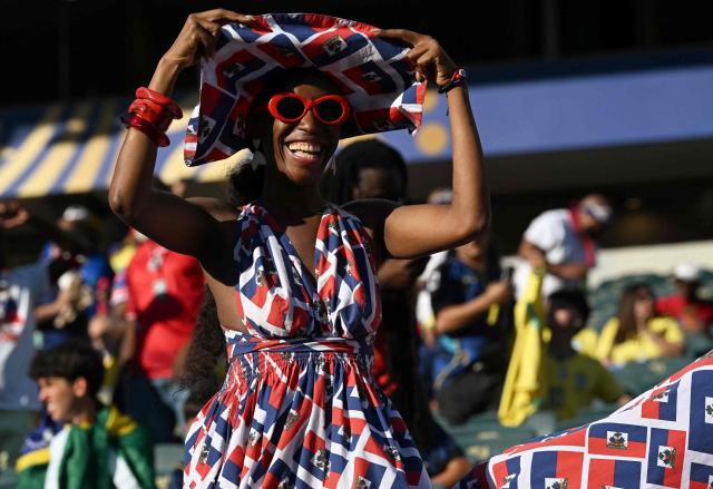 A Haiti fan supports her team ahead of the 2026 World Cup Group C football match between Brazil and Haiti at the Philadelphia Stadium in Philadelphia on June 19, 2026.  (Photo by Roberto SCHMIDT / AFP)