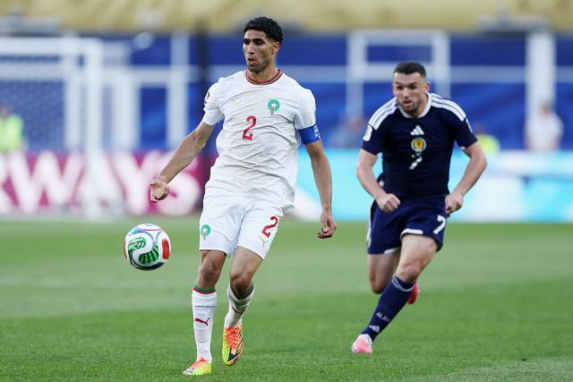 Morocco's defender #02 Achraf Hakimi controls the ball during the 2026 World Cup Group C football match between Scotland and Morocco at the Boston Stadium in Foxborough on June 19, 2026.  (Photo by FRANCK FIFE / AFP)
