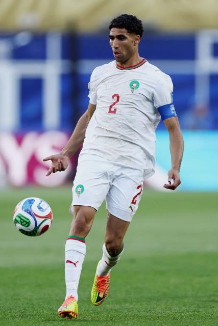 Morocco's defender #02 Achraf Hakimi controls the ball during the 2026 World Cup Group C football match between Scotland and Morocco at the Boston Stadium in Foxborough on June 19, 2026.  (Photo by FRANCK FIFE / AFP)
