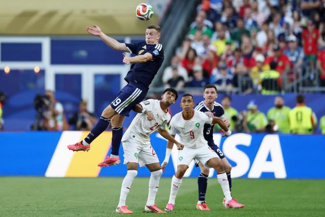 Scotland's midfielder #19 Lewis Ferguson heads the ball during the 2026 World Cup Group C football match between Scotland and Morocco at the Boston Stadium in Foxborough on June 19, 2026.  (Photo by FRANCK FIFE / AFP)