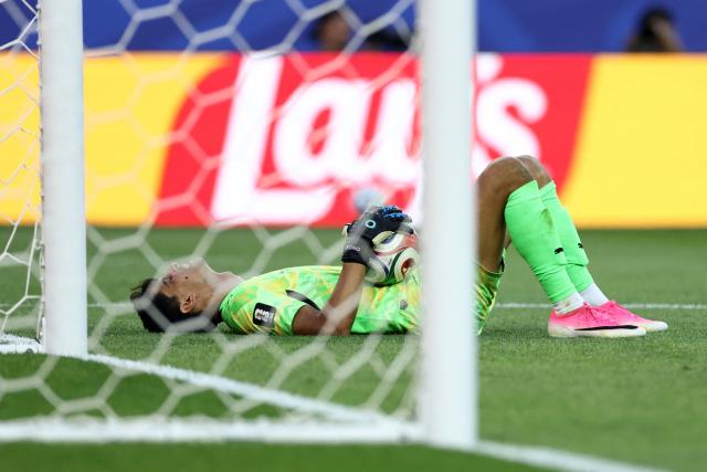 Morocco's goalkeeper #01 Yassine Bounou reacts after catching the ball during the 2026 World Cup Group C football match between Scotland and Morocco at the Boston Stadium in Foxborough on June 19, 2026.  (Photo by FRANCK FIFE / AFP)