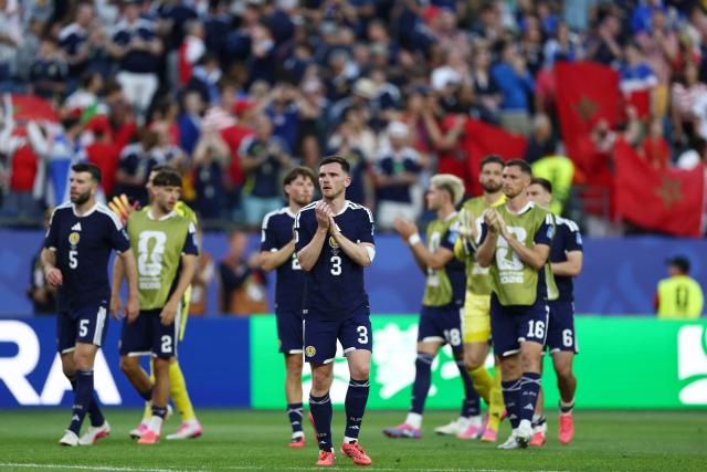 Scotland players acknowledge the crowd after losing the 2026 World Cup Group C football match between Scotland and Morocco at the Boston Stadium in Foxborough on June 19, 2026.  (Photo by FRANCK FIFE / AFP)