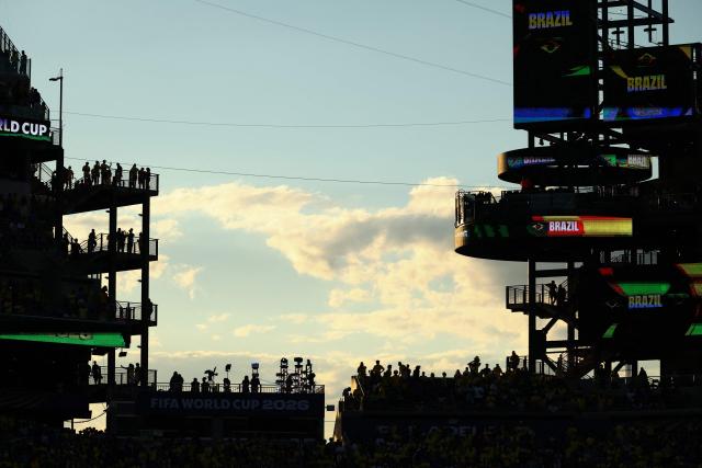 Silhouettes of fans are seen during the 2026 World Cup Group C football match between Brazil and Haiti at the Philadelphia Stadium in Philadelphia on June 19, 2026.  (Photo by Charly TRIBALLEAU / AFP)